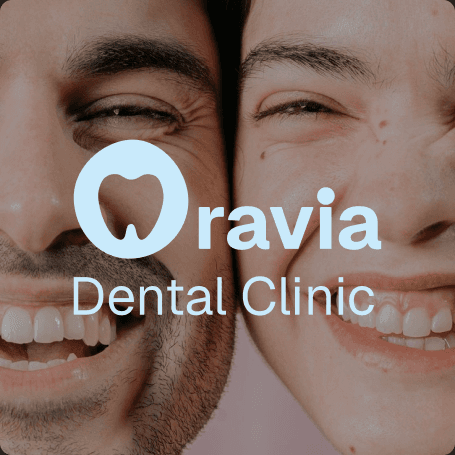 Oravia Dental Clinic - brand design with smiling patients and tooth logo